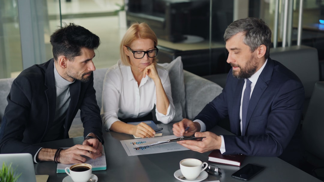 Business professionals meeting around a table