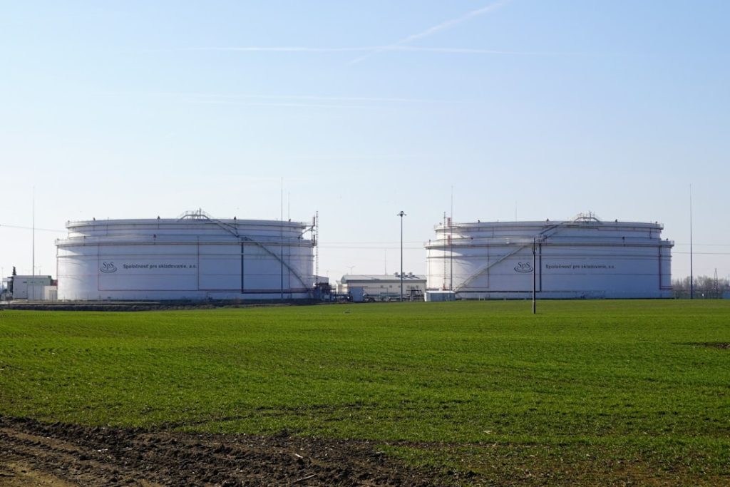 Large petroleum storage tanks at an industrial fuel storage facility